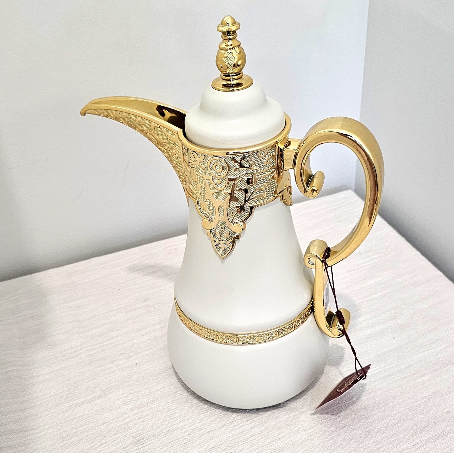 Dallah Brand Luxury Vacuum Insulated Stainless Steel Tea & Coffee Pot Elegant white Design with Gold Accents & Unique Handle Tumbler Drinkware Flasks
